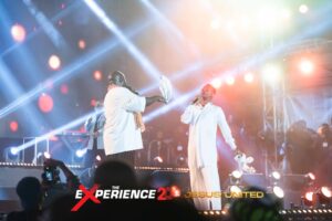 EmmaOMG The Experience Surprise 2025 on stage with Muyiwa Olanrewaju