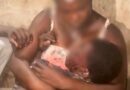 A Mother’s Grip: Holding Her Son Amidst the Jos Crisis
